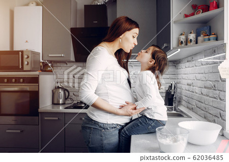 Mother with cute daughter at home 62036485