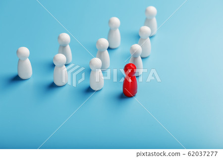 The leader in red leads a group of white employees The leader in red leads a group of white employees 62037277