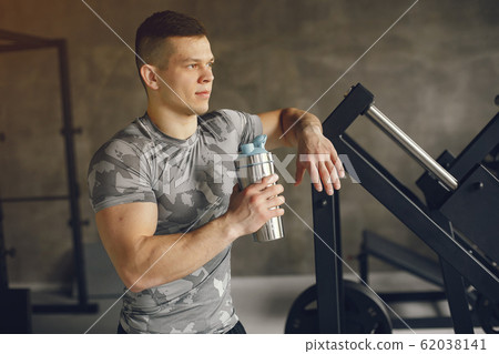 A handsome man is engaged in a gym 62038141