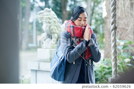 High school students visiting a shrine High school students visiting a shrine 62039626