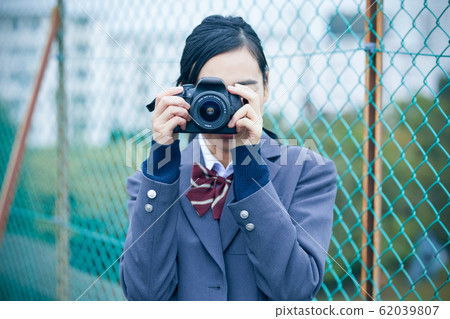 High school student taking pictures High school student taking pictures 62039807