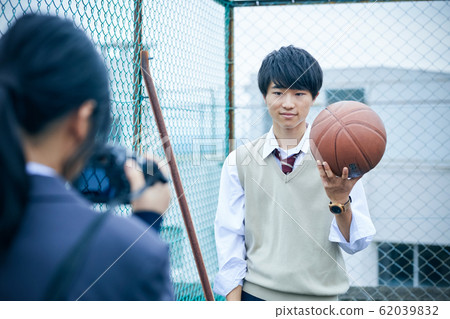 High school couple taking pictures 62039832