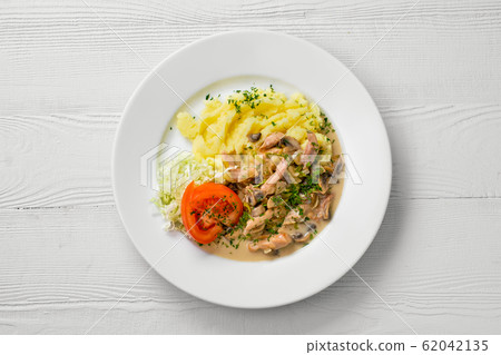 Top view of plate with chicken goulash, mushroom Top view of plate with chicken goulash, mushroom 62042135