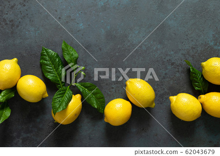 Fresh lemons with leaves, summer citrus lemonade Fresh lemons with leaves, summer citrus lemonade 62043679