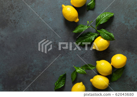Fresh lemons with leaves, summer citrus lemonade Fresh lemons with leaves, summer citrus lemonade 62043680