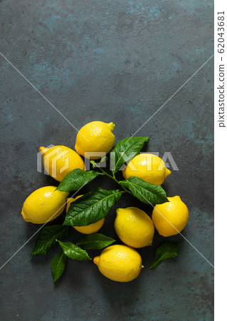 Fresh lemons with leaves, summer citrus lemonade Fresh lemons with leaves, summer citrus lemonade 62043681