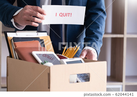 Businessman holding with I quit words card letter, Businessman holding with I quit words card letter, 62044141