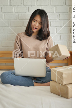 surprised frustrated upset unhappy woman online surprised frustrated upset unhappy woman online 62044539