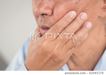 sick old senior man with toothache, dental care sick old senior man with toothache, dental care 62045179