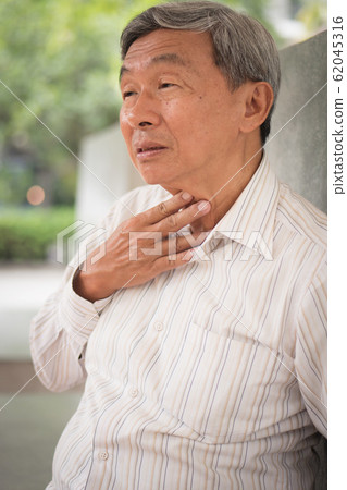sick old man with sore throat or cold or flu, sick old man with sore throat or cold or flu, 62045316