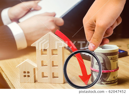 The concept of falling real estate market. Reduced interest in the mortgage. A decline in property prices and apartments. Low interest rates on mortgage loans. Reduced demand for home. selective focus 62047452