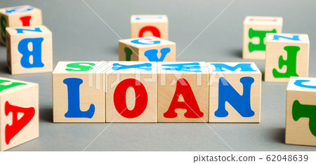 Wooden blocks with the word Loan. Consumer, banking and property loan. Business and entrepreneurial development. Small business loans. Interest rate repayment. Planning. Mortgage. Credit Wooden blocks with the word Loan. Consumer, banking and property loan. Business and entrepreneurial development. Small business loans. Interest rate repayment. Planning. Mortgage. Credit 62048639