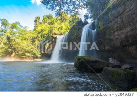 Beautiful waterfall with sunlight in jungle, Haew Suwat Waterfall at khao yai Nakhonratchasima 62049327