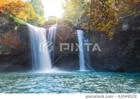 Beautiful waterfall with sunlight in jungle, Haew Suwat Waterfall at khao yai Nakhonratchasima 62049328