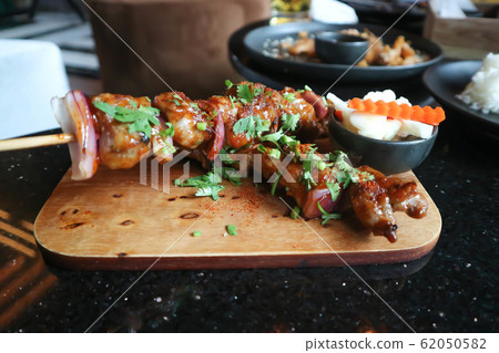 grilled pork or barbecued pork grilled pork or barbecued pork 62050582