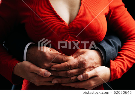 happy couple embracing in love holding. Valentine day and romance concept. 62050645