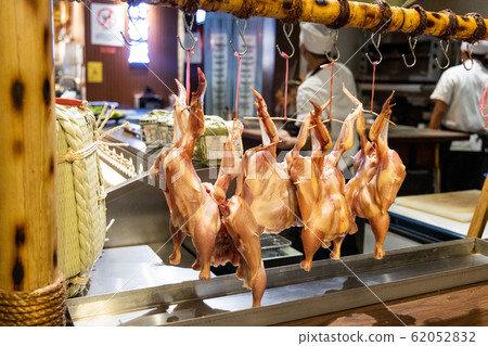 Chicken being prepared for Japanese robatayaki Chicken being prepared for Japanese robatayaki 62052832