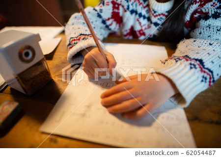 Children doing homework Children doing homework 62054487