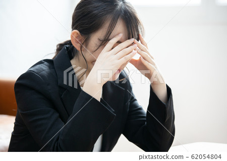 Unwell young woman depression 62054804