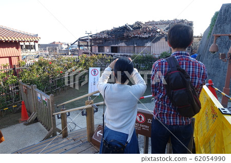 Tourists visiting the ruined Shuri Castle ruins (Okinawa) December 2019 62054990