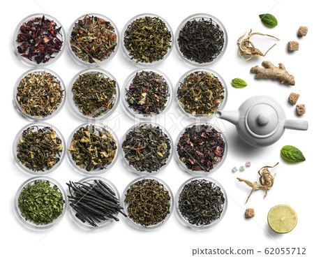 Large assortment of tea on a white background. The view from the top Large assortment of tea on a white background. The view from the top 62055712