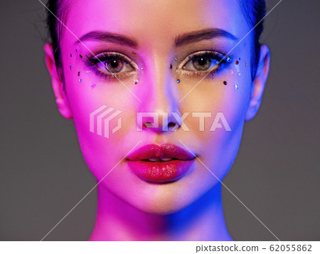 Portrait of the girl is highlighted in bright blue 62055862