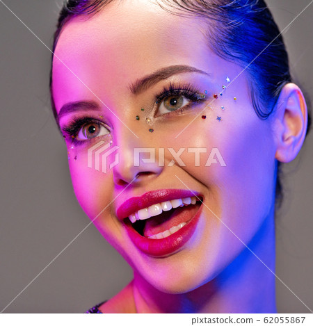 Portrait of happy girl. Laughing face of a 62055867