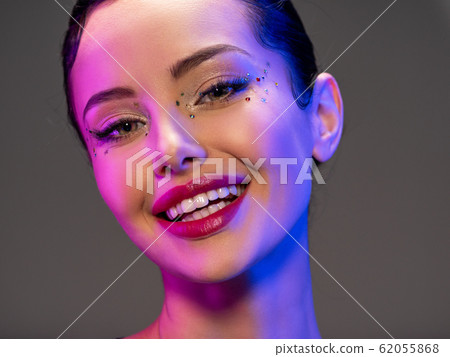 Portrait of happy girl. Laughing face of a 62055868