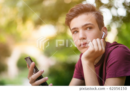 Close-up portrait of a thoughtful unhappy teenage Close-up portrait of a thoughtful unhappy teenage 62056150