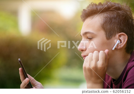 Close-up portrait of a thoughtful unhappy teenage Close-up portrait of a thoughtful unhappy teenage 62056152