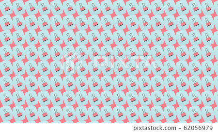 Four binder clips isolated on blue background. Four binder clips isolated on blue background. 62056979