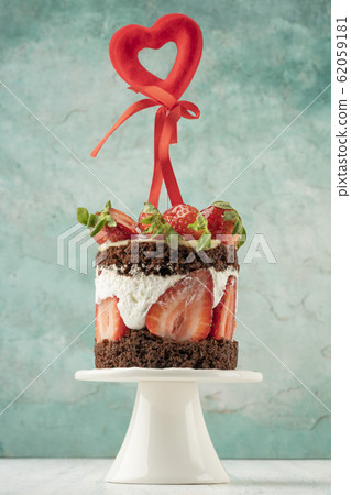 chocolate and strawberry cake decorated with heart 62059181