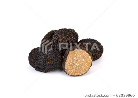 Fresh black truffles on white background 62059960