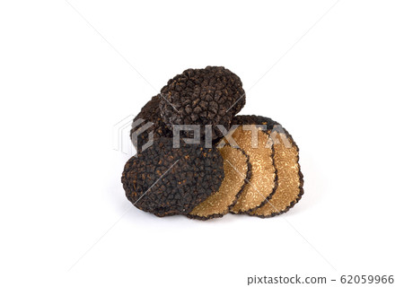 Fresh black truffles on white background Fresh black truffles on white background 62059966