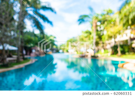 Abstract blur outdoor swimming pool in hotel resort 62060331