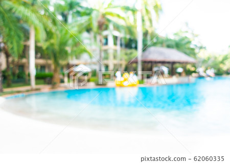 Abstract blur outdoor swimming pool in hotel resort 62060335