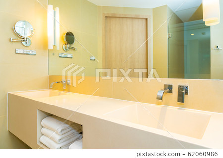 White sink with water faucet decoration in bathroom White sink with water faucet decoration in bathroom 62060986