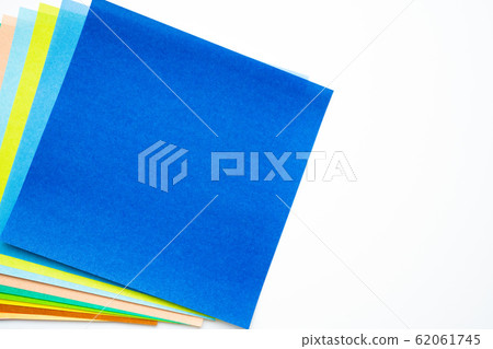 Origami colored paper white background Origami colored paper white background 62061745
