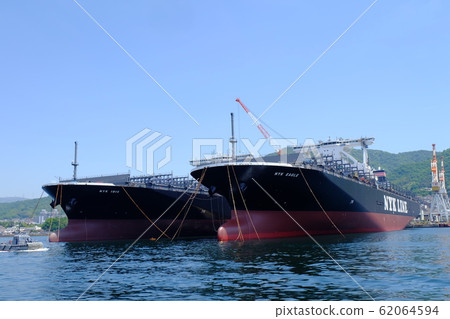 Cargo ship waiting for delivery at JMU Kure factory 62064594