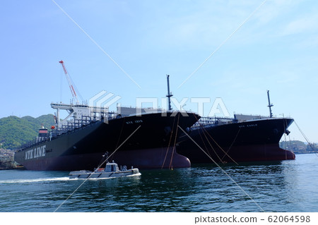 Cargo ship waiting for delivery at JMU Kure factory 62064598