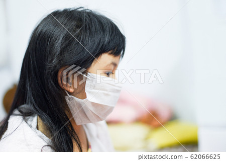 Sick child Coronavirus in China pathogen Flu 62066625