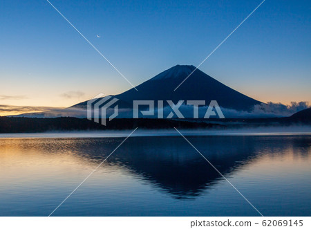 Mt. Fuji at dawn from Lake Motosu Mt. Fuji at dawn from Lake Motosu 62069145