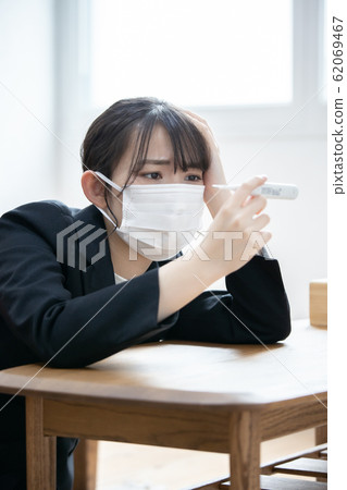 A young woman with poor physical condition A young woman with poor physical condition 62069467