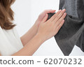 clean woman hand wash; hand portrait of asian 62070232