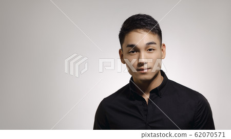 Fashion Asian Man Portrait in Black Clothes Fashion Asian Man Portrait in Black Clothes 62070571