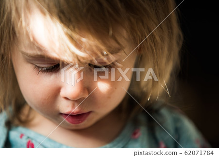 Portrait of very sweet little child with big eyes. Portrait of very sweet little child with big eyes. 62071784