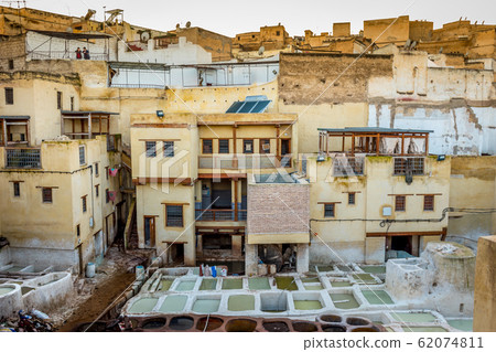 Overlooking stone vessels in tanneries, Fez, Morocco Overlooking stone vessels in tanneries, Fez, Morocco 62074811