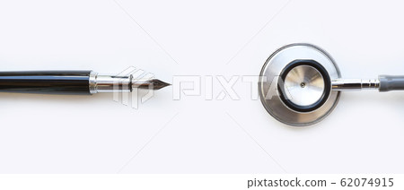 close up of stethoscope with pen 62074915