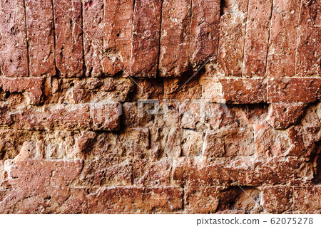 The ancient brick wall was neatly arranged and so strong that there was no space, even a small needle could not penetrate at Dhammayangyi Temple in Bagan, Myanmar. The ancient brick wall was neatly arranged and so strong that there was no space, even a small needle could not penetrate at Dhammayangyi Temple in Bagan, Myanmar. 62075278