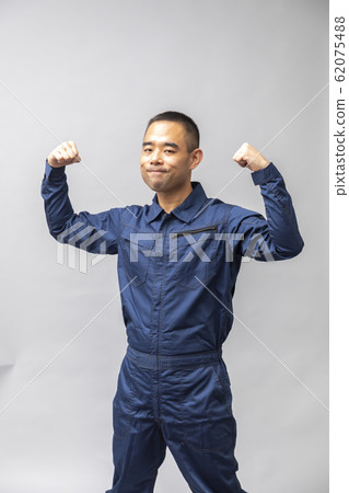 Men in jumpsuits Men in jumpsuits 62075488